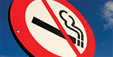 Safe and Healthy Me - Tobacco Free - No smoking sign against a beautiful blue sky