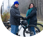 Kristina and Pete take a break from a winter bike ride on a foggy Anchorage bike trail. They both joined programs that are free for eligible Alaskans to help lower their blood pressure and blood sugar.  