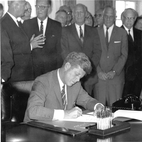 Photo of JFK signing