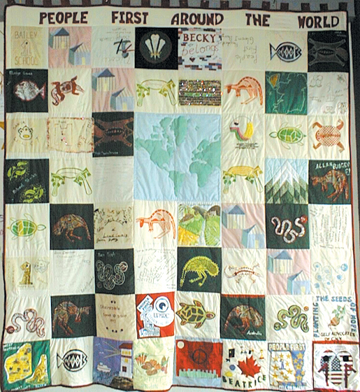 Quilt titled "People First Around the World"